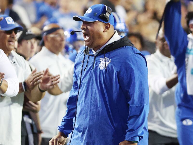 BYU coach Kalani Sitake celebrates a touchdown in Provo on Thursday, Sept. 29, 2022.