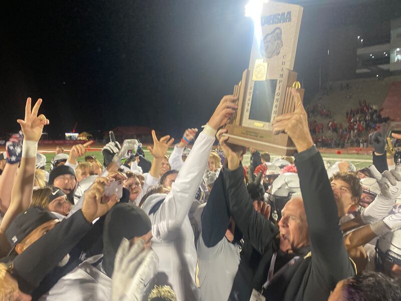 The Desert Hills Thunder celebrate winning the 4A state football championship at Utah Tech in St. George on Friday, November 11, 2022.