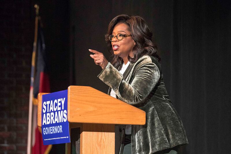 Oprah Winfrey speaks to a crowd during a town hall conversation for gubernatorial candidate Stacey Abrams in 2018.