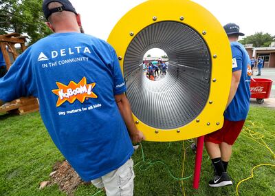 Volunteers from Delta Air Lines, Utah Community Action and the community join KaBOOM! in transforming an empty site into a kid-designed, state-of-the-art playground at James R. Russell Head Start in Salt Lake City on Saturday, July 14, 2018. The new playg
