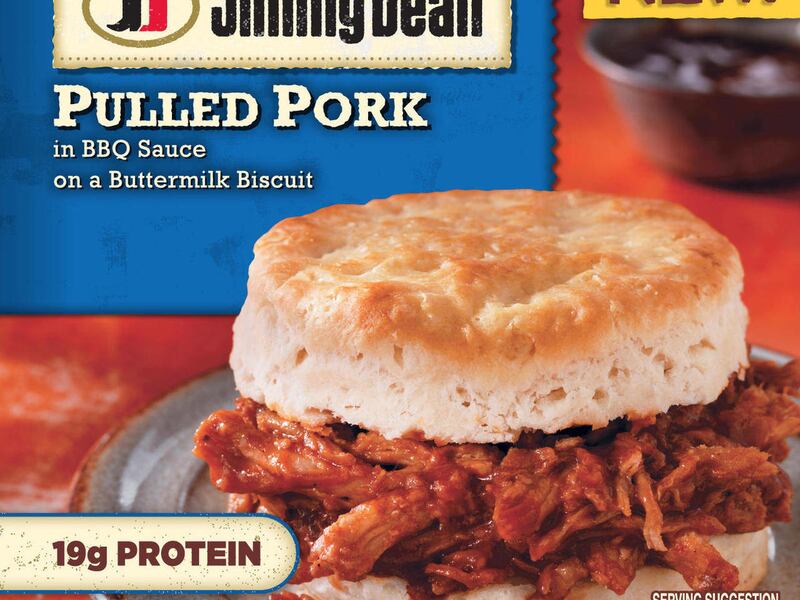 This photo provided by Hillshire Brands shows the packaging for a Jimmy Dean Pulled Pork sandwich. Jimmy Dean, the breakfast sausage brand started by the late country singer of the same name, is hoping its new bowls and sandwiches can lure eaters at other