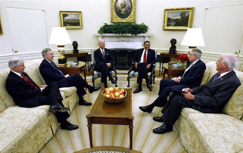 President Barack Obama and Vice President Joe Biden, center, meet with senators in the Oval Office of the White House in Washington, Wednesday, to discuss the Supreme Court appointment. From left are, Sen. Jeff Sessions, R-Ala., ranking Republican on the