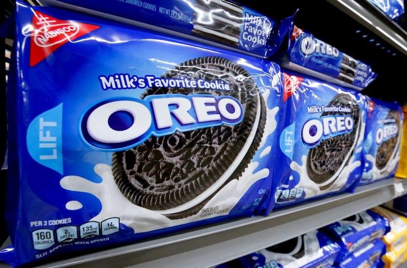 Packages of Nabisco Oreo cookies line a shelf in a market in Pittsburgh, Wednesday, Aug. 8, 2018.