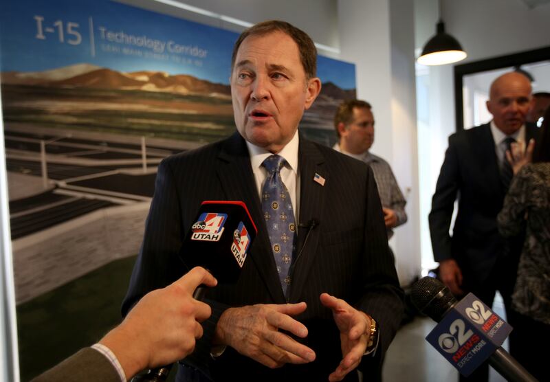 Gov. Gary Herbert talks about the Utah Department of Transportation’s I-15 Technology Corridor construction project at the Rain office in Lehi on Wednesday, April 25, 2018.