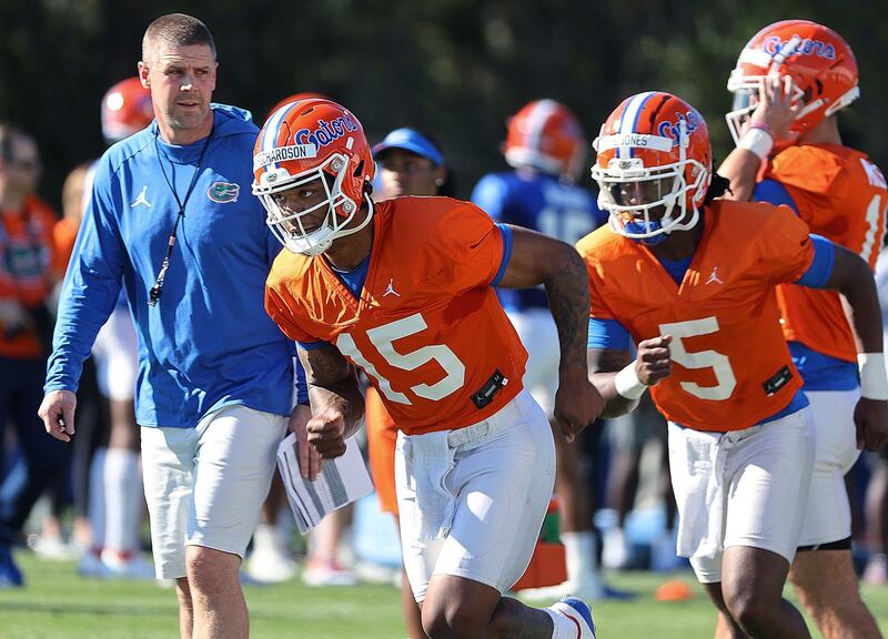 Florida coach Billy Napier watches his QBs, including Anthony Richardson, during practice, March 17, in Gainesville, Fla.