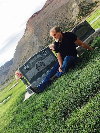 Leo Paur, pictured here at the graves of his parents in Helper, Utah, wrote and directed the 1993 Feature Films for Families movie, "Rigoletto."