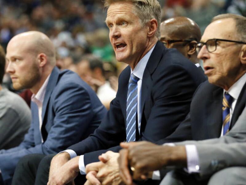 Golden State Warriors head coach Steve Kerr shouts in the direction of an official late in the second half of an NBA basketball game against the Dallas Mavericks on Tuesday, March 21, 2017, in Dallas. (AP Photo/Tony Gutierrez)