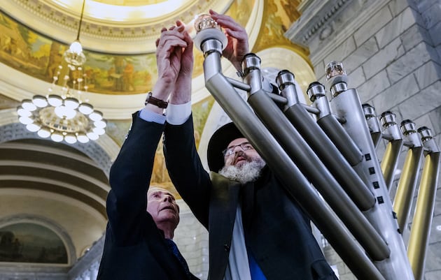Hanukkah celebration proceeds as Utah rabbis say they ‘will not give in to terror’