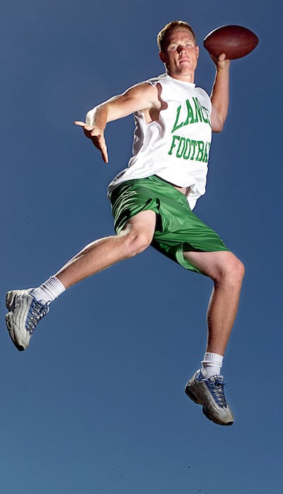 Ben Olson, 18, senior quarterback for Thousand Oaks High in California, poses for a picture at Ventura High on June 28, 2001.