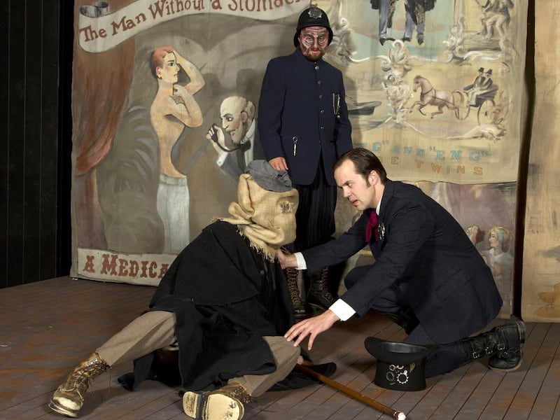 Graham Ward is John Merrick and Darick Pead is Frederick Treves in BYU's handsomely staged "The Elephant Man." Eric Gourley, rear, as a policeman.