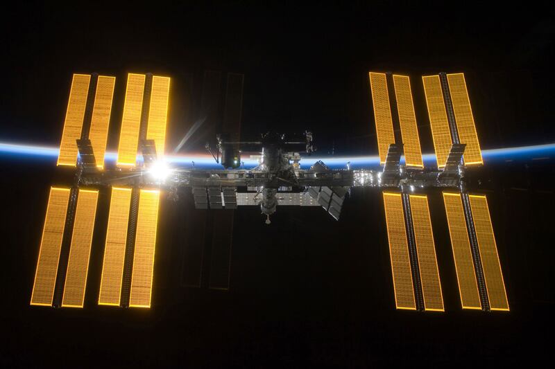 This March 25, 2009 photo provided by NASA shows the International Space Station seen from the Space Shuttle Discovery during separation. In the background is Earth's atmosphere seen as a blue arc. On Tuesday, April 30, 2019, NASA announced that a major p