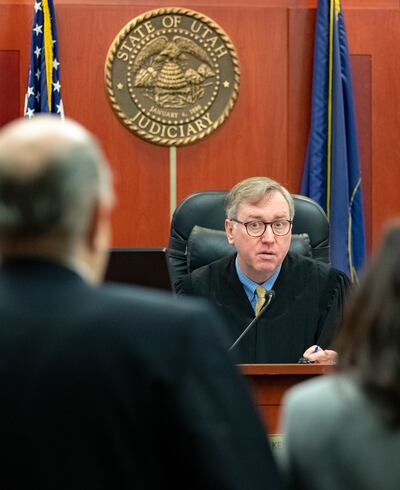 Third District Judge Keith Kelly talks to Brent E. Taylor, former director of the Utah Valley Youth Symphony, and his attorney, Cara Tangaro, during a hearing at the Matheson Courthouse in Salt Lake City on Monday, Jan. 7, 2019. Taylor, who is accused of