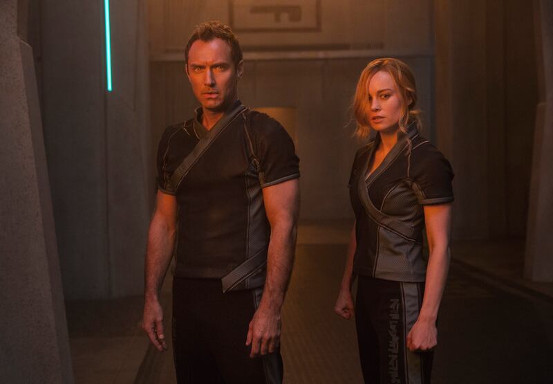 This image released by Disney-Marvel Studios shows Jude Law, left, and Brie Larson in a scene from "Captain Marvel."