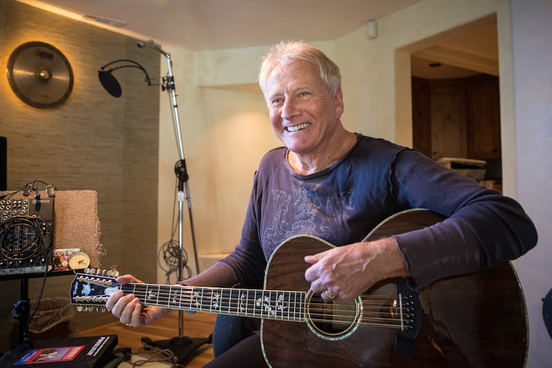 Graham Russell of Air Supply plays guitar inside his newly renovated studio at his home in Kamas on Monday, Nov. 5, 2018.