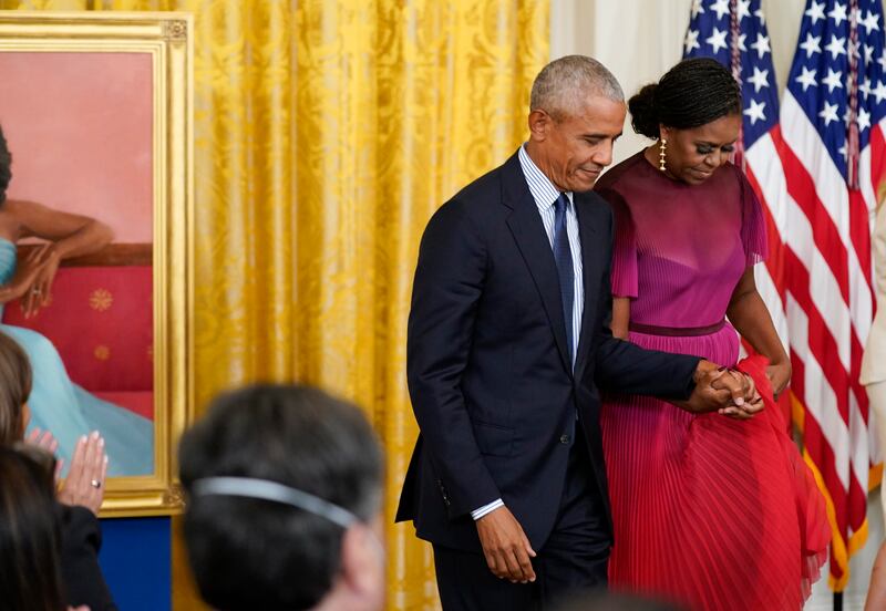 Former President Barack Obama and former first lady Michelle Obama in the East Room of the White House, Sept. 7, 2022.