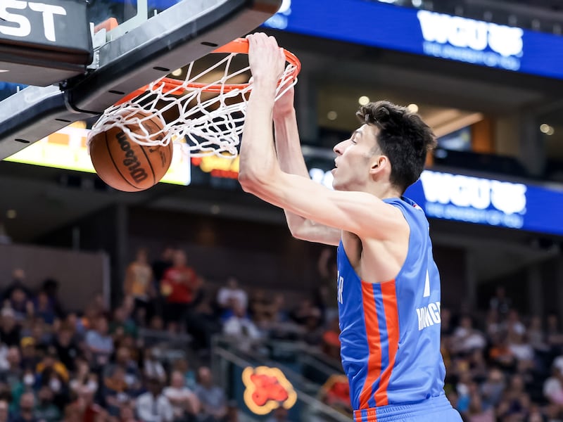 Chet Holmgren of the Oklahoma City Thunder dunks during a Summer League game against the Utah Jazz at Vivint Arena in Salt Lake City on Tuesday, July 5, 2022.