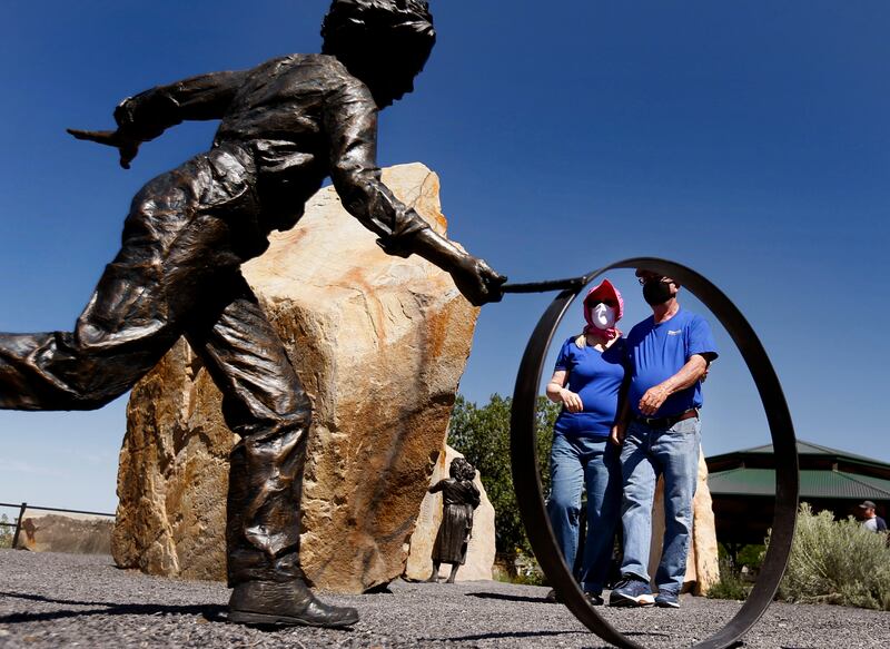 Carolyn Savage Wright and her husband, David Wright, of Provo tour the Pioneer Children’s Memorial at This Is The Place Heritage Park.