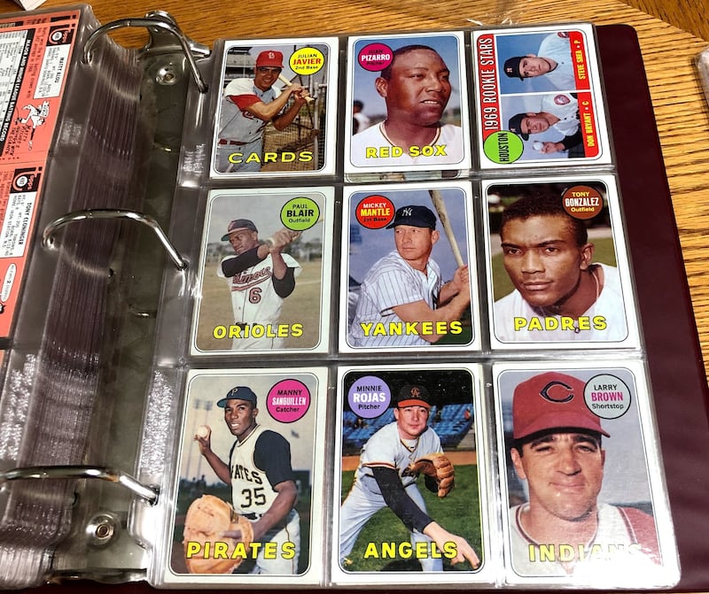 Dave Avila's extensive baseball card collection includes more than a few Mickey Mantles.