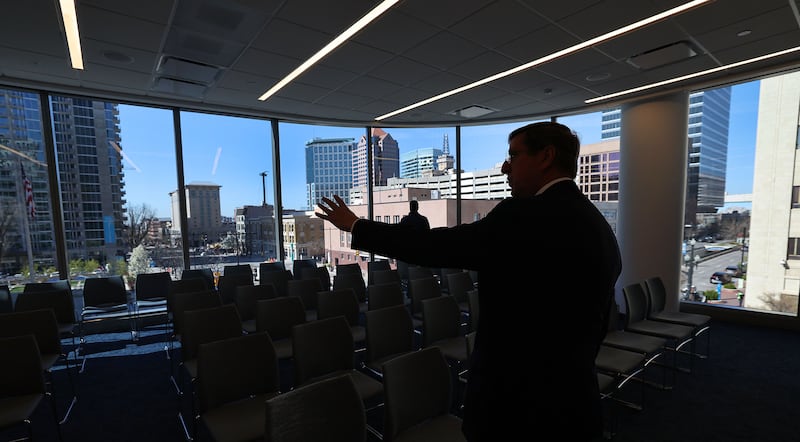 Elder Kevin W. Pearson gives news media a tour of the new urban meetinghouse.