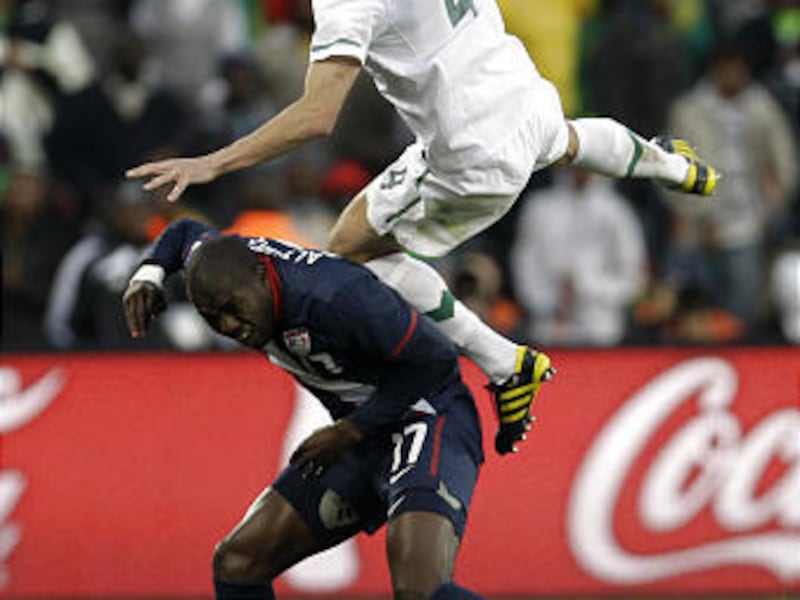 United States' Jozy Altidore, left, competes for the ball with Slovenia's Marko Suler, right, during the World Cup group C soccer match between Slovenia and the United States at Ellis Park Stadium in Johannesburg, South Africa, Friday.