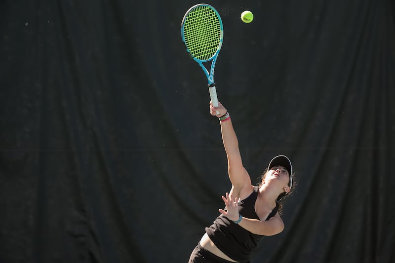 Sophie Baker of Rowland Hall faces Afton Orgill of Grantsville in the 3A 1st singles match on Saturday, Oct. 7, 2023.