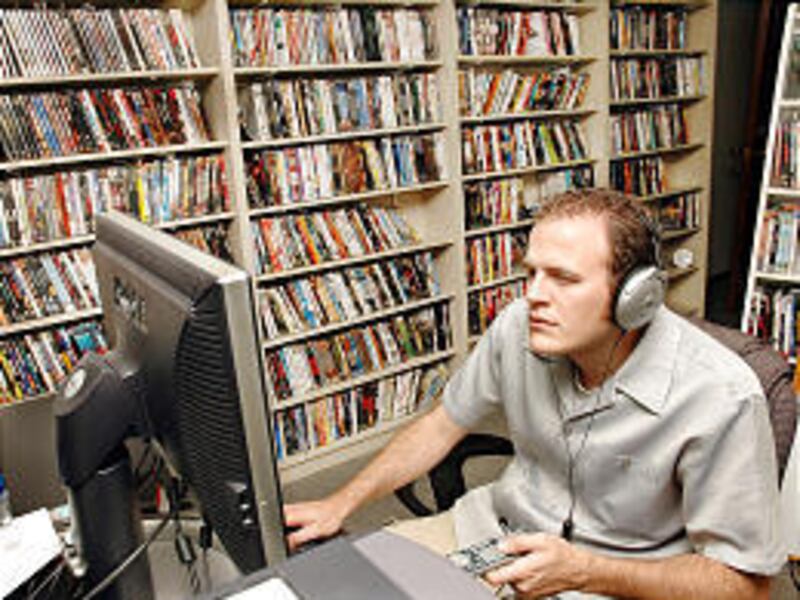 Adam Reader of ClearPlay screens a film, categorizing content that viewers might wish to filter.