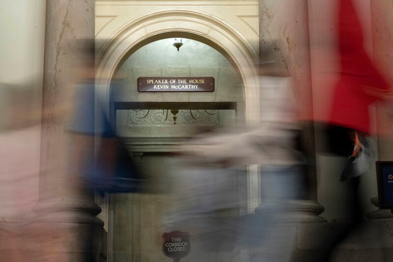 Visitors pass by the office of former House Speaker Kevin McCarthy, R-Calif., at the Capitol in Washington, on Oct. 9, 2023.