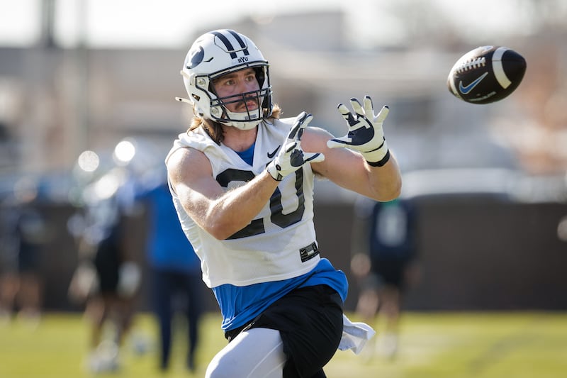 Utah transfer Carsen Ryan makes a catch during spring camp in Provo. Ryan is among a handful of tight ends who committed to BYU during the offseason.