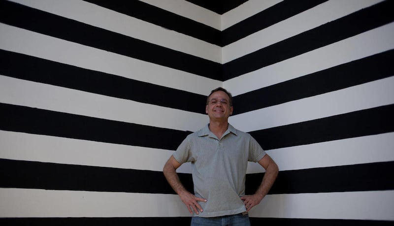 Artist Gregory Sale stands in the Arizona State University Art Museum on April 27, 2011 in Tempe, Ariz. Sale, tasked with making an interesting gallery space at the ASU Art Museum, did so by procuring two separate groups of Maricopa County jail inmates t
