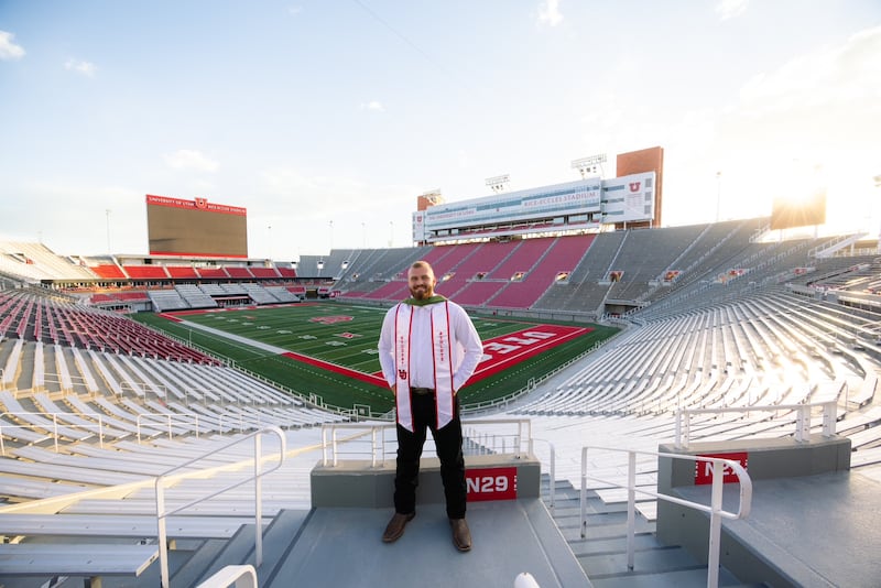 Former Utah center Jaren Kump and recent Utah graduate stands in an empty Rice-Eccles Stadium in Salt Lake City.