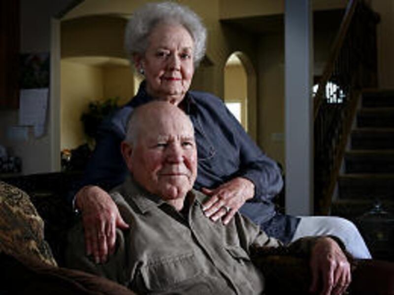 Survivor Ret. Col. Emmett "Cyclone" Smith, 87, poses with wife Marjorie. A pilot stationed at Pearl Harbor, he witnessed the Dec. 7, 1941, attack.