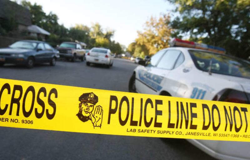 Crime scene tape marks an area in Salt Lake City at the scene of a fatal stabbing in October 2009. New research shows undocumented immigrants account for only a small percentage of violent crimes committed in Utah.