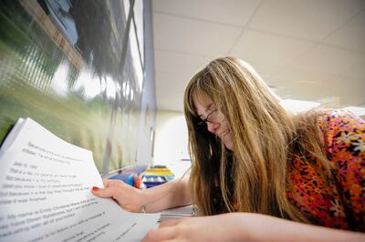 Emily Arthur cleans up her workspace at the end of the school day at Corner Canyon High School in Draper on Thursday, April 26, 2018.