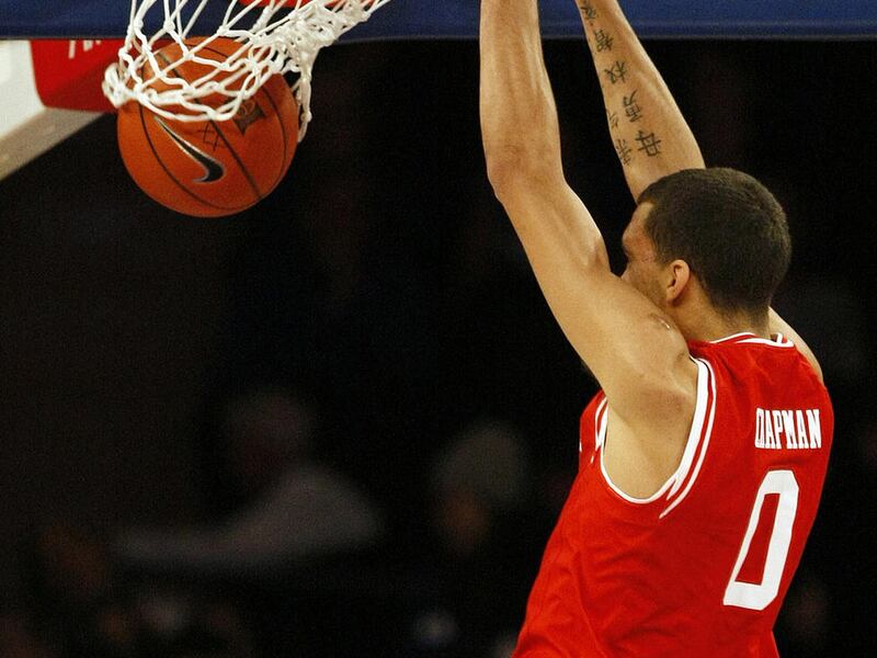 Utah Utes forward Brekkott Chapman (0) slam dunks the ball during the first half of the Ameritas Insurance Classic against the Duke Blue Devils at Madison Square Garden in New York City, Saturday, Dec. 19, 2015.