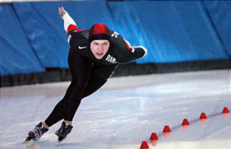 Elli Ochowicz races around the track Saturday on the Olympic Oval in Kearns.