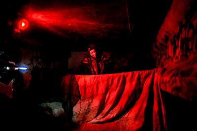 Shawn Spalding, an outreach worker for Volunteers of America - Utah, talks to Marie VanValkenburg, right, and Nathen Brown, out of view, at a camp they have been sleeping at under a bridge along the Jordan River in South Salt Lake on Thursday, Jan. 24, 20