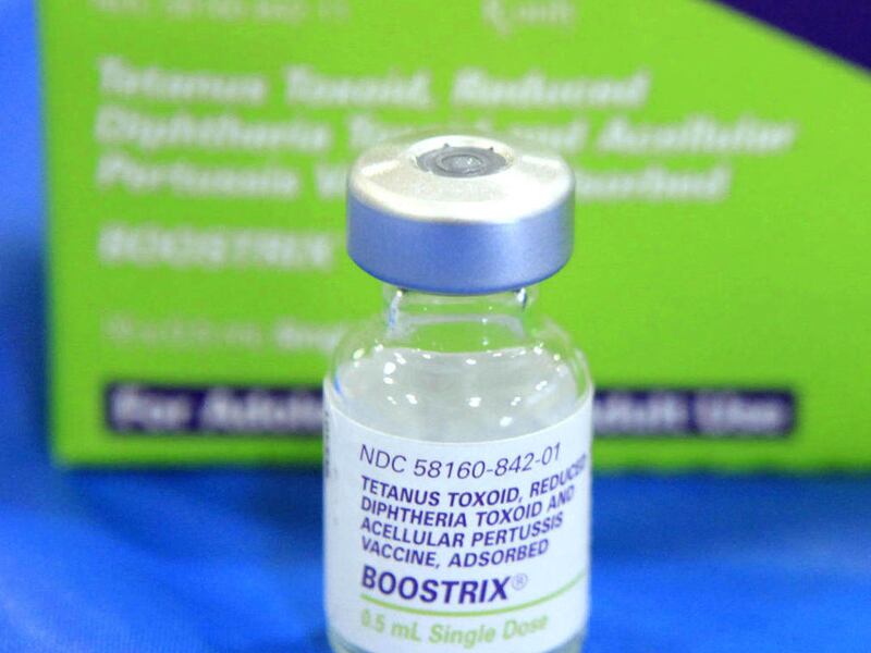 An empty bottle of Tetanus, Diphthera and Pertussis, (whooping cough) vaccine sits on display at Inderkum High School, Monday, Sept. 19, 2011, in Sacramento, Calif.