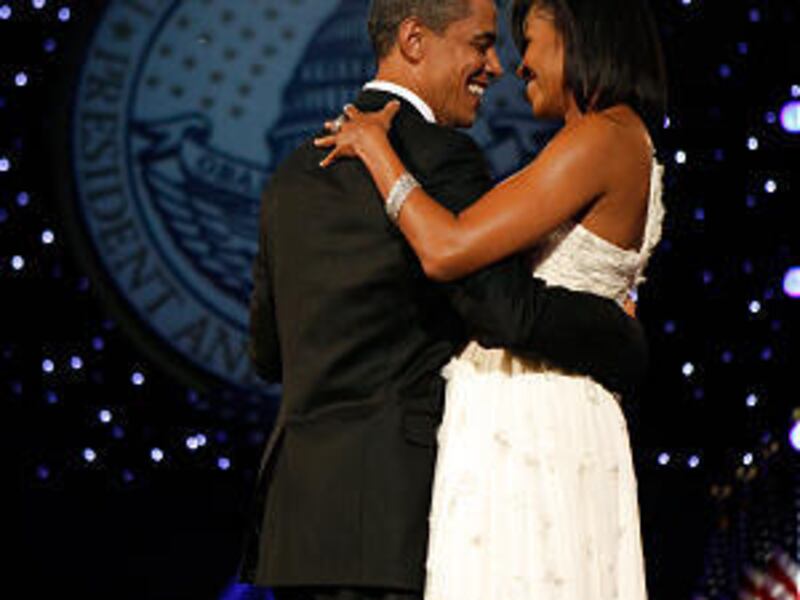 President Barack Obama and first lady Michelle Obama dance at the Neighborhood Inaugural Ball at the Washington Convention Center.