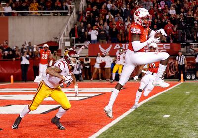 Utah Utes defensive back Jaylon Johnson catches an interception with USC Trojans wide receiver Michael Pittman Jr. at left during NCAA football in Salt Lake City on Saturday, Oct. 20, 2018.