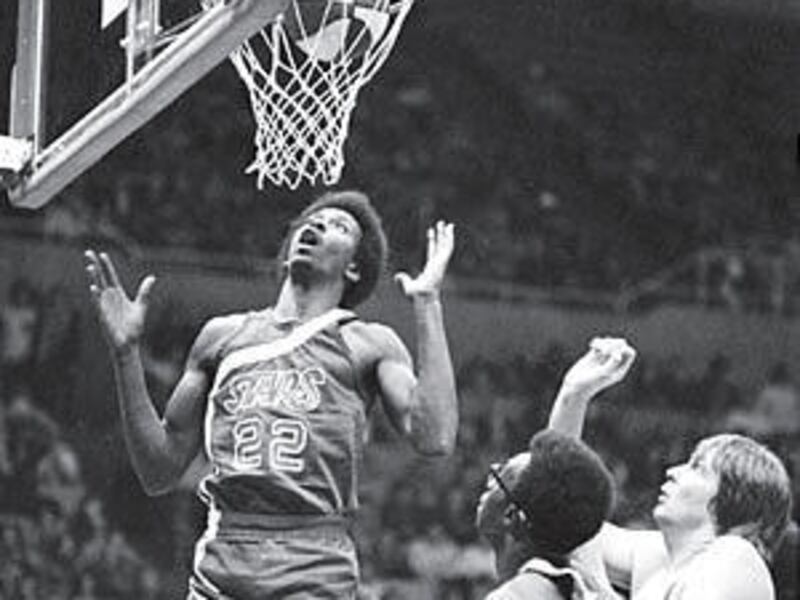 Moses Malone, left, was the first modern-era player to make the jump straight from high school to the pros.