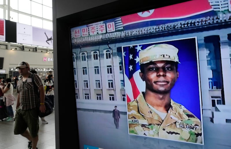 A TV screen shows a file image of American soldier Travis King during a news program at the Seoul Railway Station in Seoul, South Korea, Wednesday, Aug. 16, 2023. North Korea claims King was escaping the U.S. military due to abuse and racism.