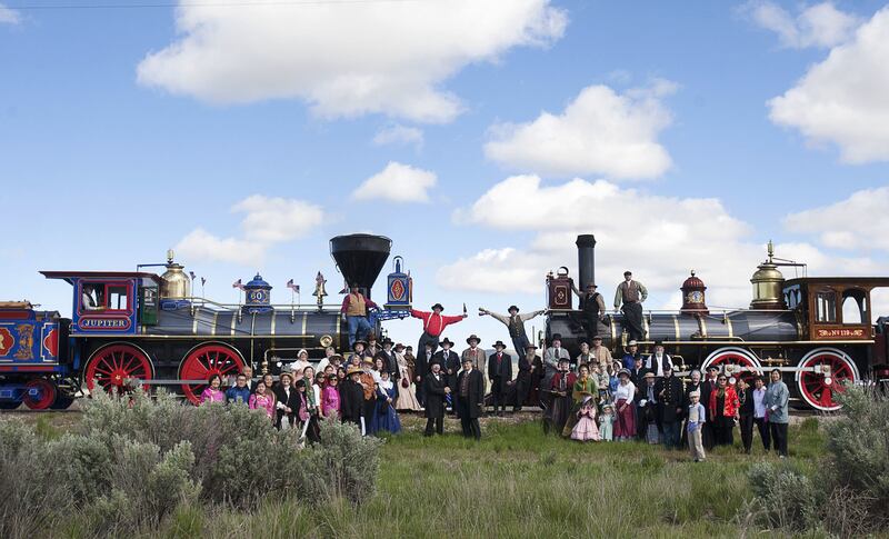 History enthusiasts pose for a reenactment photo at the Golden Spike commemorative ceremony in Brigham City, Tuesday, May 10, 2016.