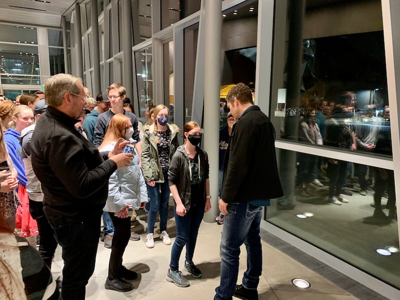 Annicka Harris, 18, of North Logan, speaks with Dallas Jenkins, creator of “The Chosen” after an event at Utah State University.