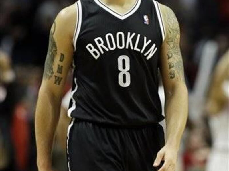 Brooklyn Nets guard Deron Williams reacts as he walks off the court after their 83-82 loss to the Chicago Bulls in an NBA basketball game in Chicago on Saturday, Dec. 15, 2012. (AP Photo/Nam Y. Huh)