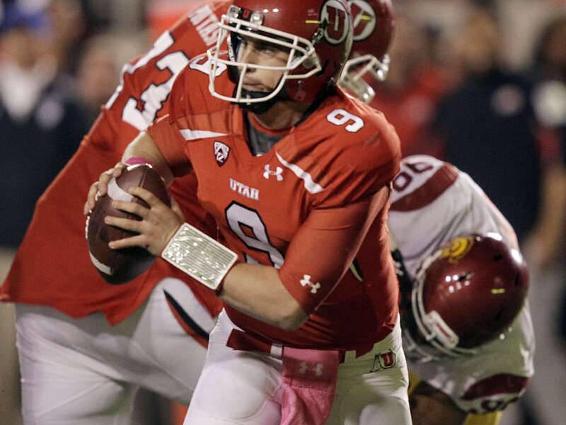 Utah Utes quarterback Jon Hays (9) scrambles during Pac-12 football in Salt Lake City, Thursday, Oct. 4, 2012.