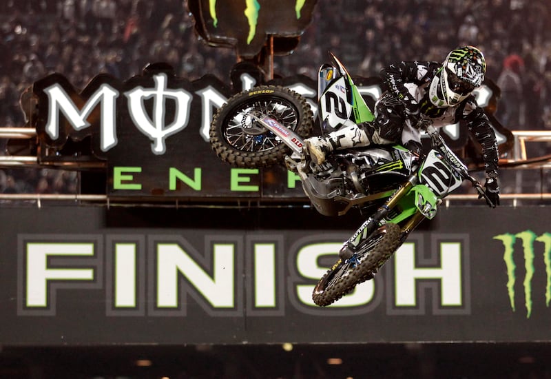 This Jan. 22, 2011, file photo shows Ryan Villopoto crossing the finish line to win the Monster Energy Supercross motorcycle race at Dodger Stadium in Los Angeles.