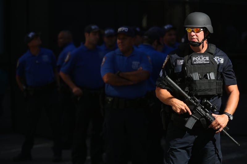 New York City police stand guard outside St. Patrick's Cathedral prior to the arrival of Pope Francis in New York, Thursday Sept. 24, 2015.