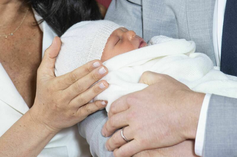 Britain's Prince Harry and Meghan, Duchess of Sussex, during a photocall with their newborn son, in St George's Hall at Windsor Castle, Windsor, south England, Wednesday May 8, 2019. Baby Sussex was born Monday at 5:26 a.m. (0426 GMT; 12:26 a.m. EDT) at a