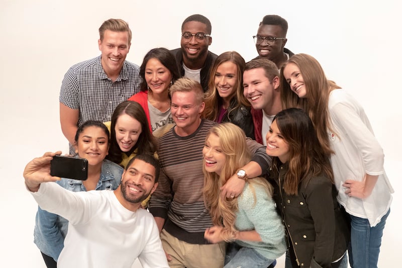 A group of Utah millennials pose for a photo.