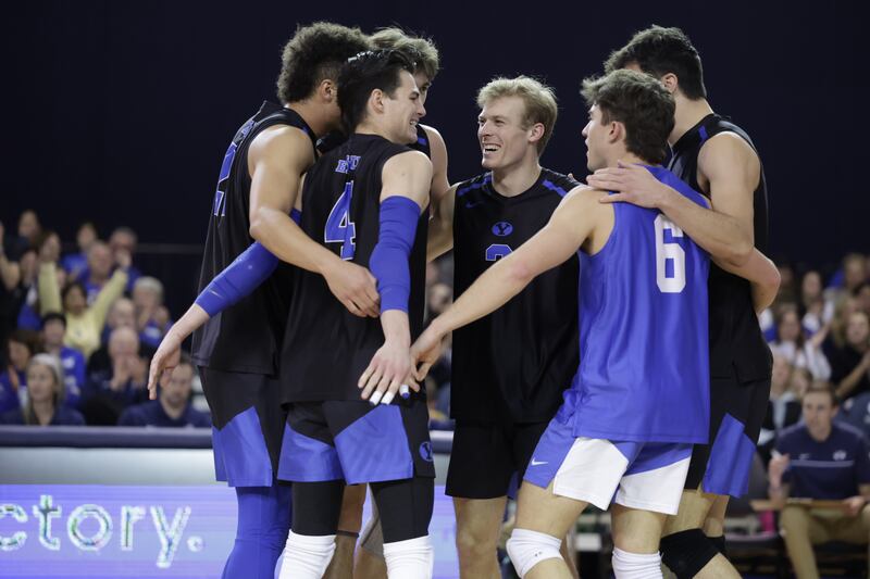 The BYU Cougars volleyball team celebrates during its sweep of the Princeton Tigers on Monday, January 22, 2024 at Smith Fieldhouse in Provo, Utah.